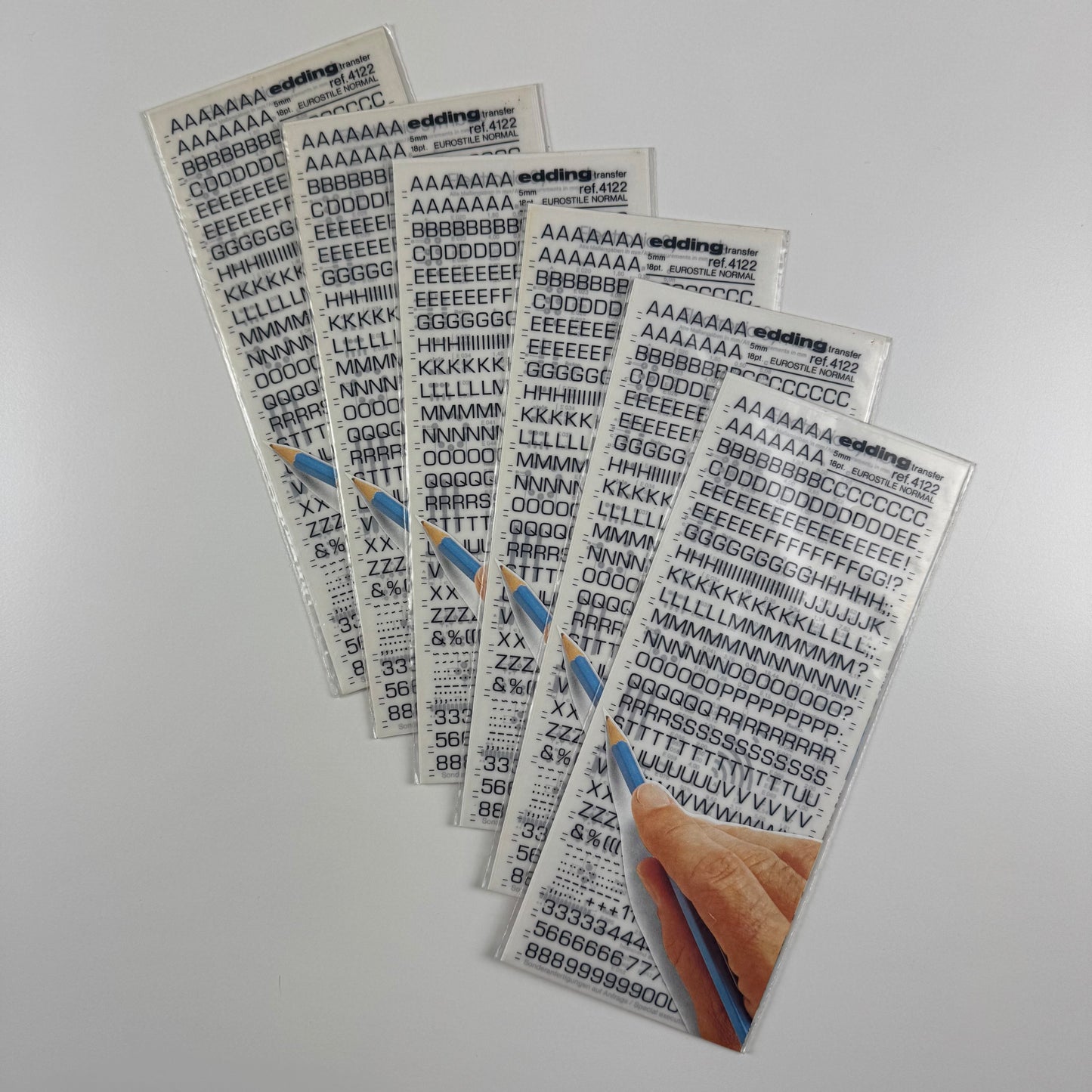 Six unopened packs of sheets of edding transfer ref 4122 Eurostile Normal 18 point