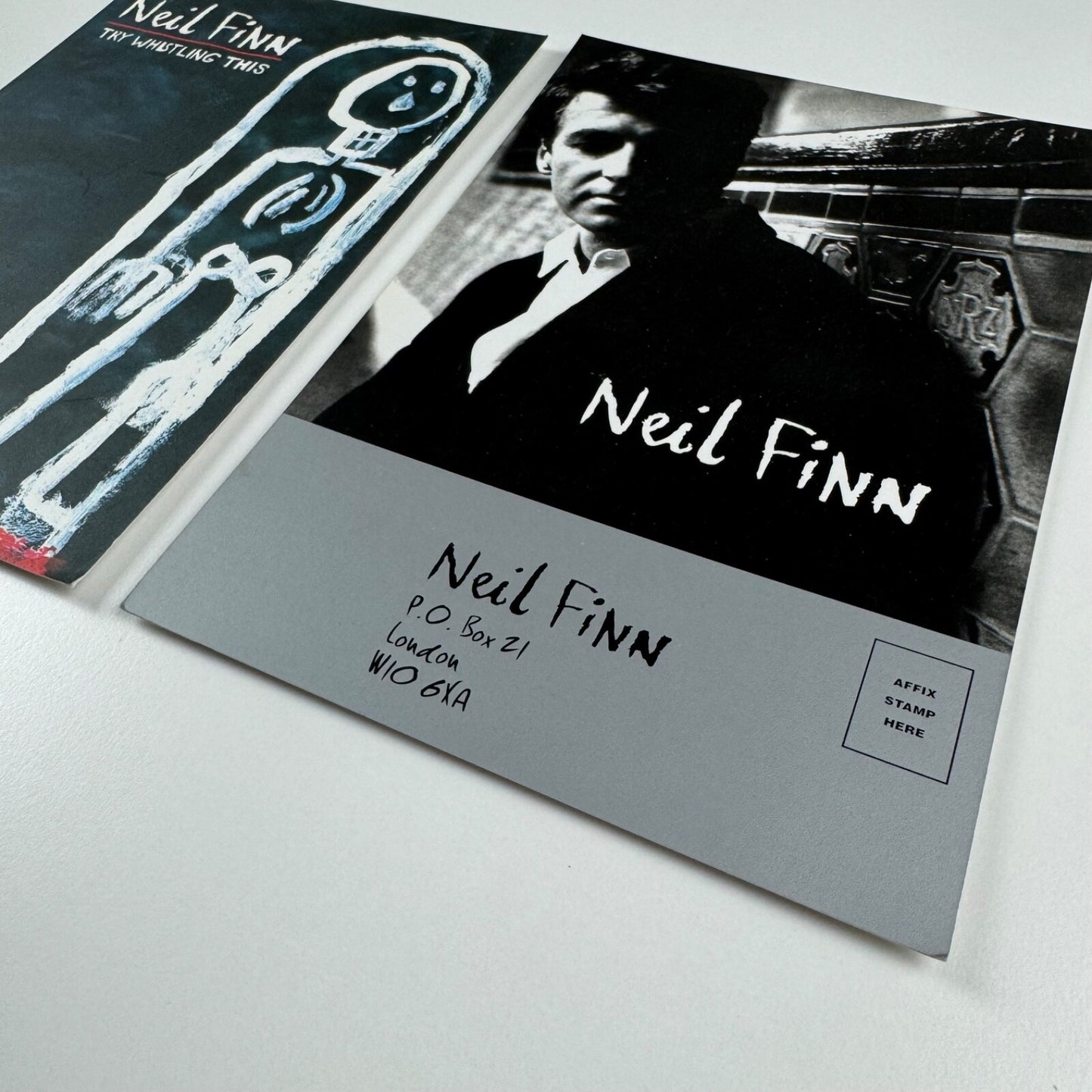 Two promotional cards for musician Neil Finn, undated