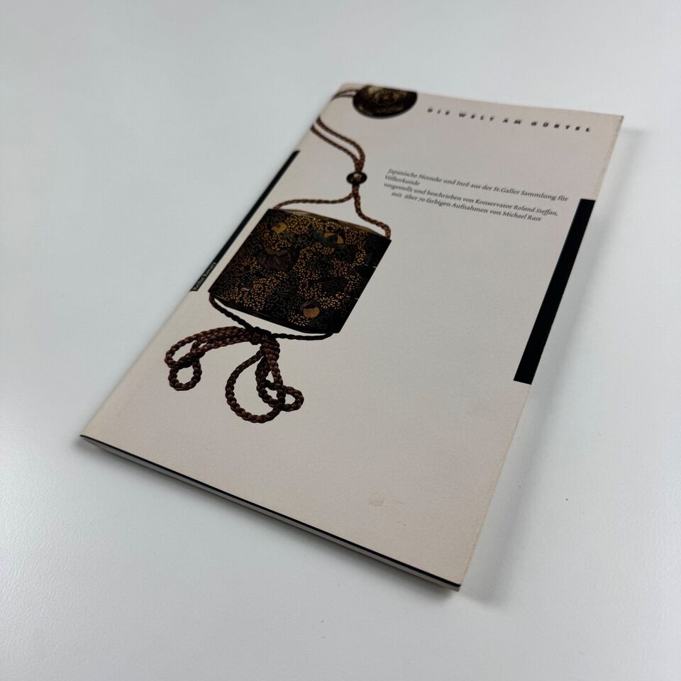 Die Welt am Gürtel. Japanische Netsuke und Inrô aus der St Galler Sammlung für Völkerkund. Designed by Jost Hochuli. Includes slip signed by Jost Hochuli