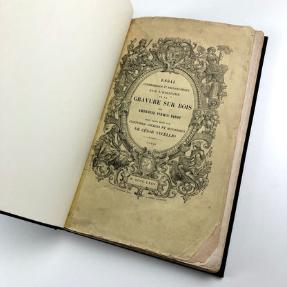 Essai typographique et bibliographique de l'histoire de la gravure sur bois. Pour faire suite aux costumes anciens et modernes de César Vécellio by A.F. Didot | César Vécellio, 1863