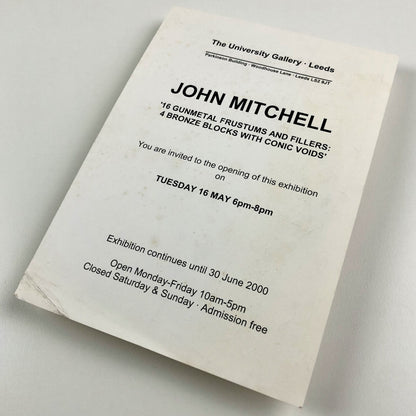 John Mitchell – 16 gunmetal frustums and filers: 4 bronze blocks with conic voids | The University Gallery Leeds | Private view card, 2000