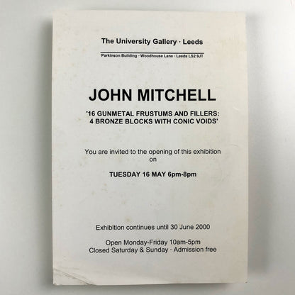 John Mitchell – 16 gunmetal frustums and filers: 4 bronze blocks with conic voids | The University Gallery Leeds | Private view card, 2000