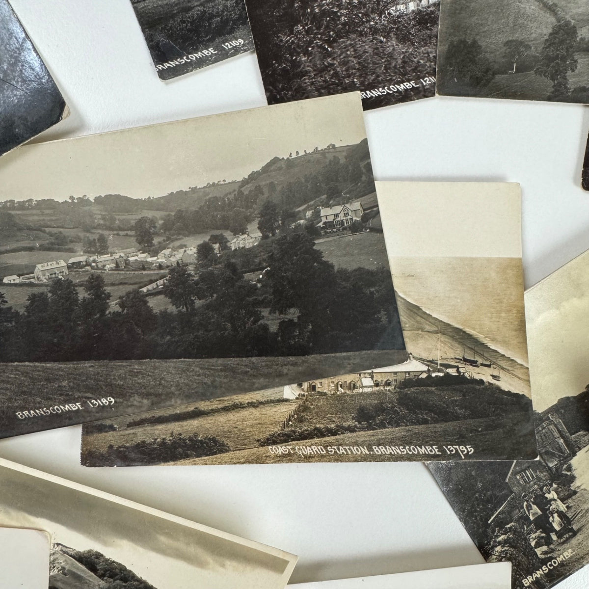Collection of 54 black and white RP postcards of Branscombe Devon one lot