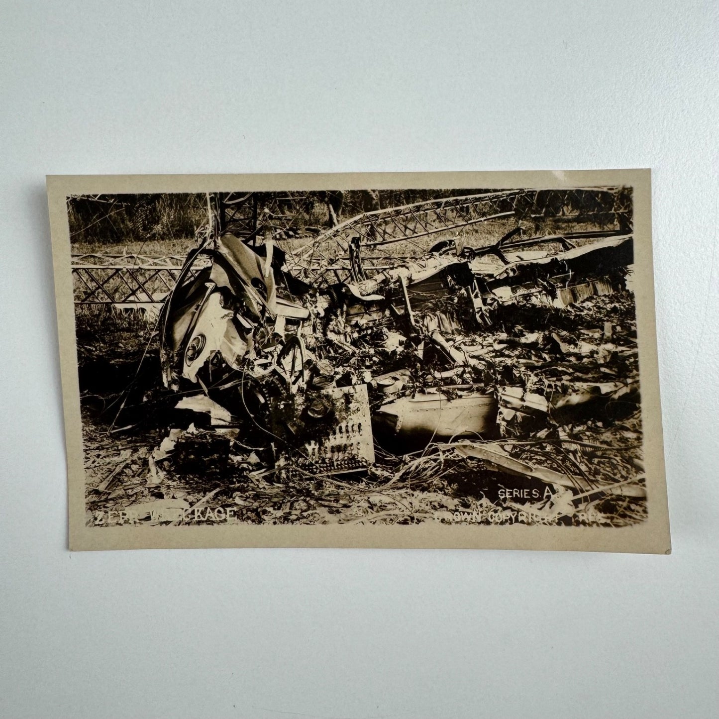 Postcard L32 wreckage of Zeppelin shot down by Lt Frederick Sowrey on 24 September 1916. With embossed stamp