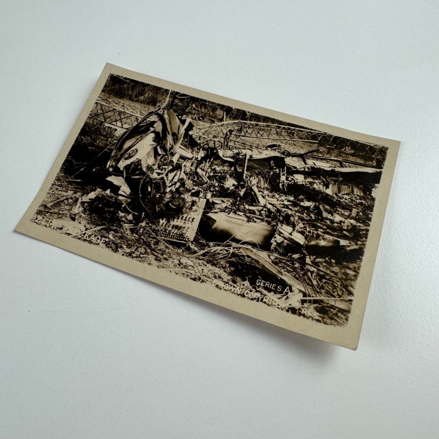 Postcard L32 wreckage of Zeppelin shot down by Lt Frederick Sowrey on 24 September 1916. With embossed stamp