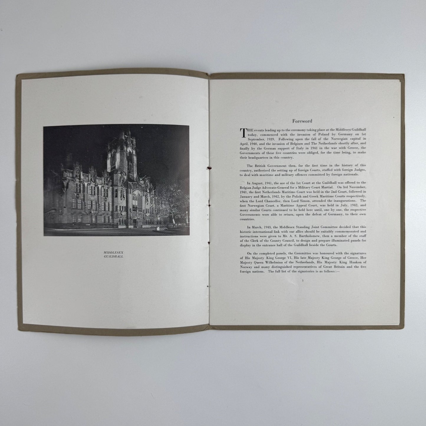 Commemorative booklet to accompany the Unveiling by the Lord Chancellor of panels commemorating the holding of Foreign Maritime Courts at the Guildhall during the World War, 1939-1945 at the Middlesex Guildhall, Westminster on 2 June 1947