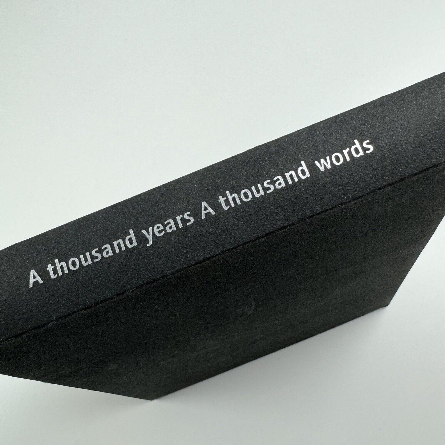 A thousand years A thousand words. A Celebration of the Royal Mail Millennium Stamps project by Michael Benson | The Camberwell Press, 1999